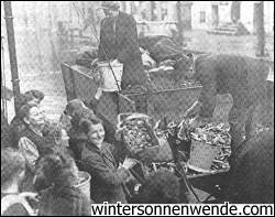 Berliners exchange potato peelings for firewood