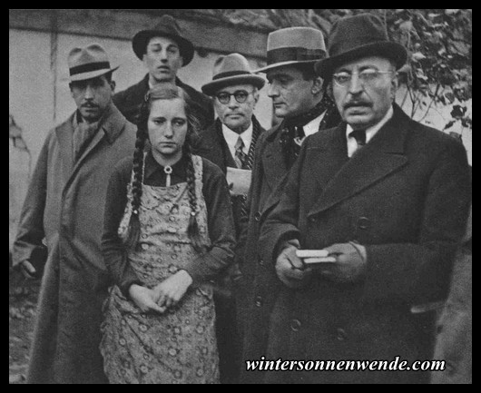 Foreign doctors listen to the eye-witness account of 
14-year-old Dora Radler.